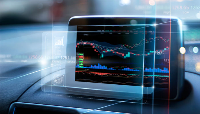 Stock market data display on virtual screen in the car on city